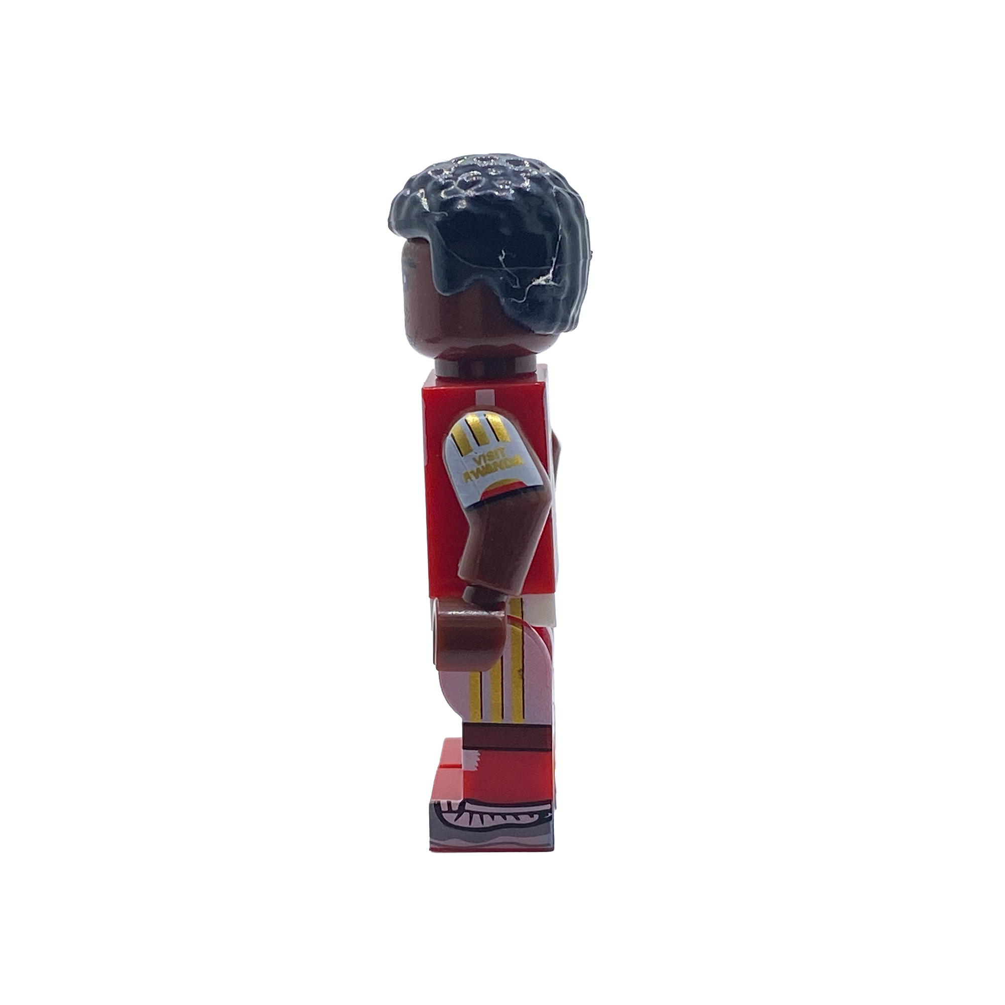 Side view of Bukayo Saka custom brick figure in Arsenal home kit