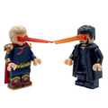 Homelander and Billy Butcher custom minifigures battling with red and orange eye-beam effect pieces