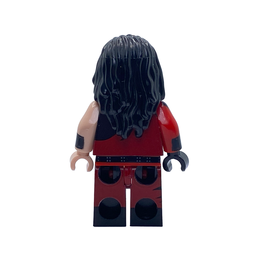 Rear view of the Kane WWE custom minifigure showing long black hair and the back of his red-and-black ring attire.