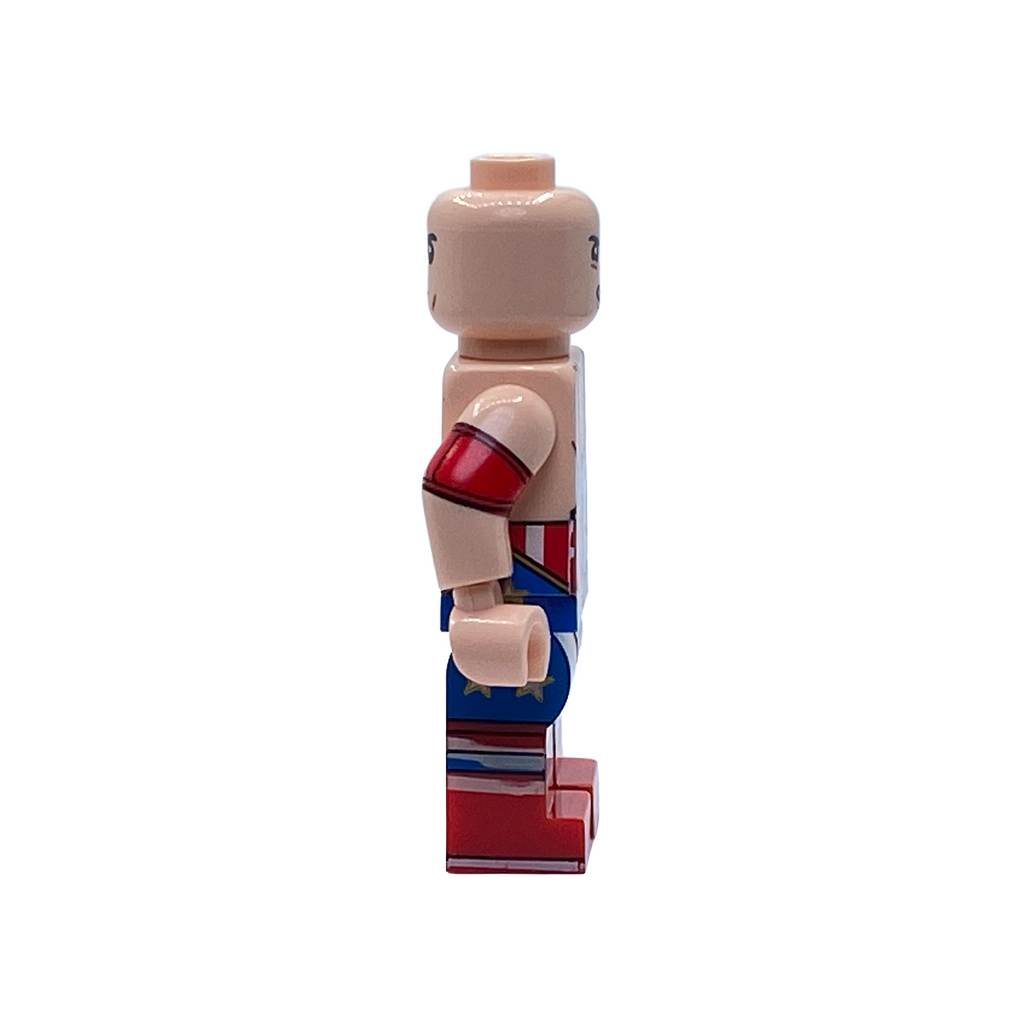 Side profile of the Kurt Angle WWE custom minifigure showing the red, white and blue singlet and arm tattoo details.
