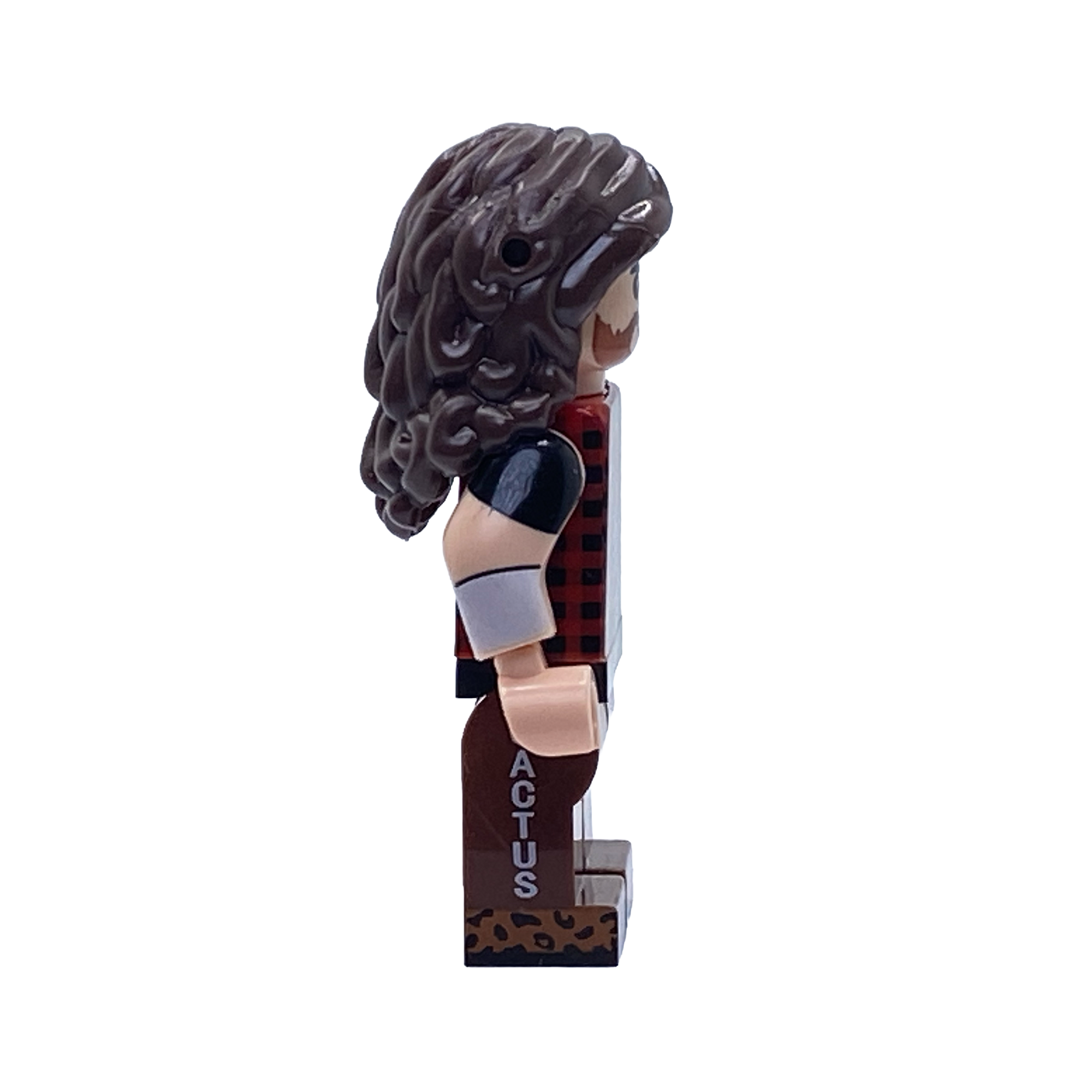 Side profile of the Mick Foley Cactus Jack custom minifigure showing long brown hair, plaid shirt, white wristband and CACTUS leg print.
