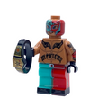 Rey Mysterio 619 WWE custom minifigure with red-and-teal mask, tattooed torso and split-colour trousers, holding a championship belt.