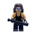 Sting WWE custom minifigure with long black hair, black-and-white face paint and all-black ring attire, holding a black baseball bat.